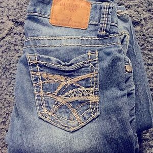 Almost new pair of Amethyst boot cut blue jeans Size 1